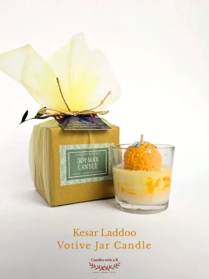 My Kesar Laddoo Votive Jar Candle is a festive favorite. This unique design, which looks just like the traditional Indian sweet, is made with scented soy wax and is a perfect, playful gift for Diwali or any celebration.