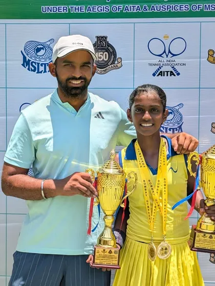 A coach and his champion. I am pictured here with Trisha Bhosale and her two trophies from the National Series, celebrating a perfect tournament week.