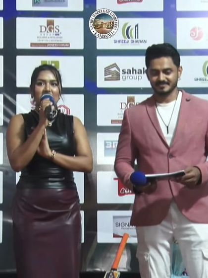 A moment of gratitude on stage with my co-host. Teamwork is key to a successful event.