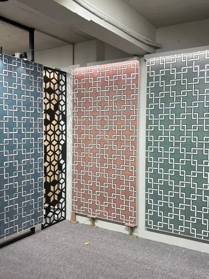 A display of our large-format wall tiles with geometric patterns in various colorways. These are perfect for creating impactful feature walls without the complexity of wallpaper.