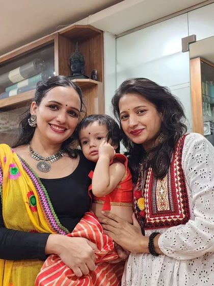 A sweet moment with one of our youngest participants at the Garba Night. Our studio is a welcoming space for the entire family.
