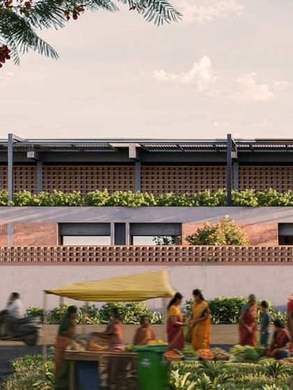 The street-facing facade of the school in Mandya, designed as a rural insert. The building's perforated brick screen and elevated planters respond to the local context while creating a distinct institutional identity.