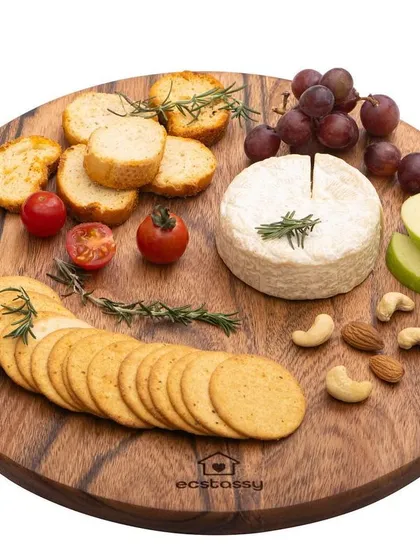 A product-on-white shot of a fully styled Ecstasy wooden cheese board. This image is both appetizing and clearly showcases the product, making it perfect for a website homepage.