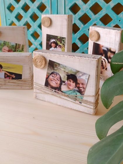 A family of photo blocks, each holding a different memory. These are perfect for creating a gallery of moments on a shelf or mantle.
