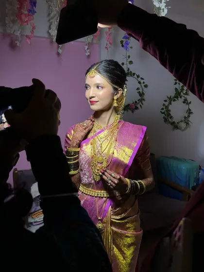 Creating a regal bridal look for this stunning South Indian bride was a dream. I used a minimal foundation technique to create a naturally glowy base that enhanced her features without feeling heavy, letting her traditional jewelry and saree take center stage.