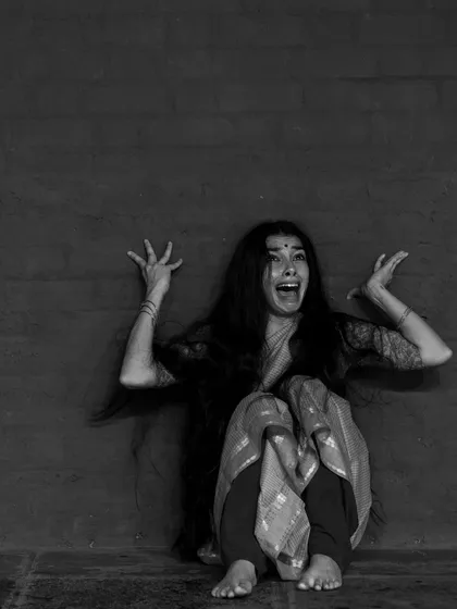 My foundation in Bharatanatyam taught me to access and portray core emotions, or 'rasas'. This shot is from an intense exploration of 'Bhaya', the rasa of fear, showing how I use my entire body and being to find the truth in a character's most vulnerable moments.
