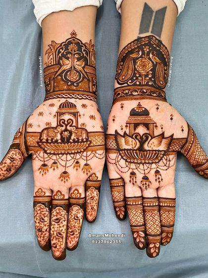 A beautiful bridal set with a modern touch. The design features swans on a lotus, with one arm having a BTS logo tattoo incorporated into the traditional patterns.