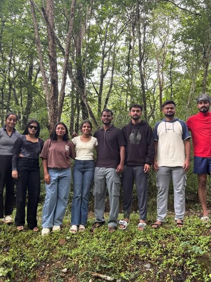 A group photo in the woods during our Dudhsagar falls trek.