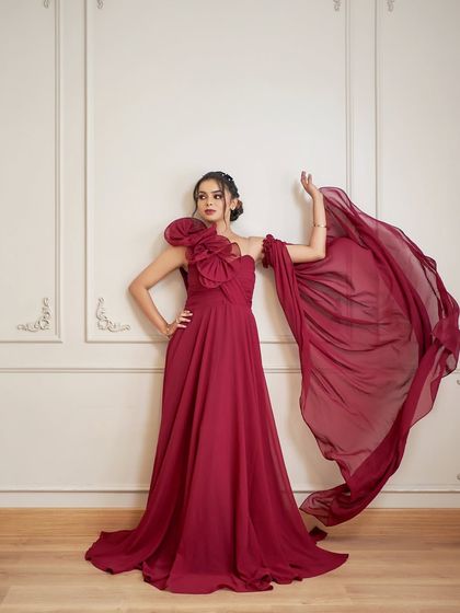 The 'Nicolas' gown is designed for drama. This shot shows off its detachable flowing tail, which adds incredible movement and elegance to your photos.