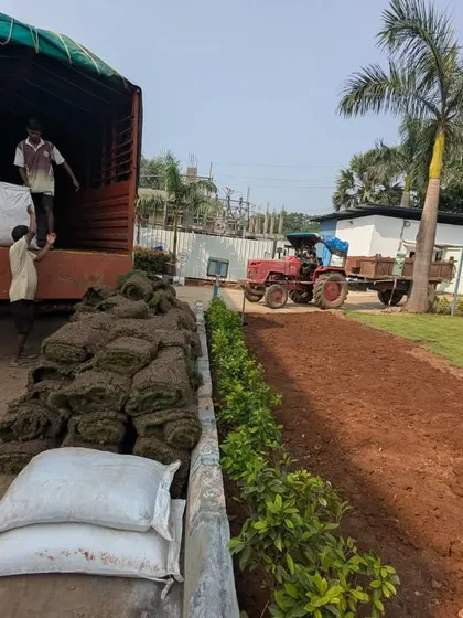 Logistics in action. We use tractors and trucks to efficiently move soil, compost, and turf across large project sites.