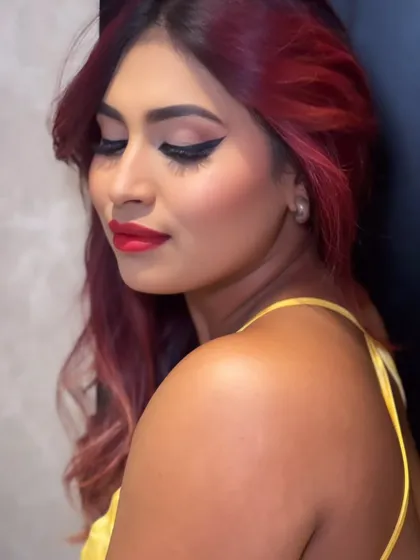 Another angle of this stunning party look, showing the flawless winged liner and glowing skin.