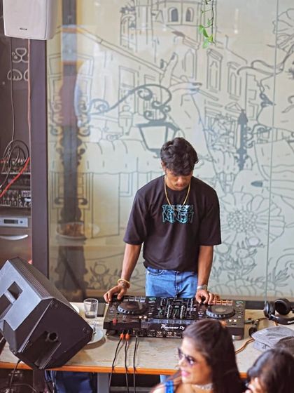 A wider shot of my sundowner setup, with the crowd enjoying the music in the background.