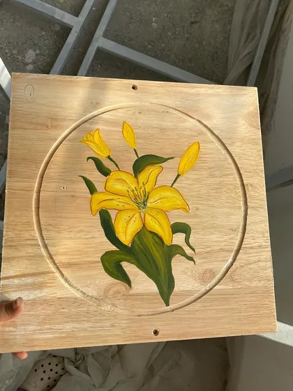 This panel showcases a vibrant yellow lily. Each board in the series features a different flower, creating a diverse botanical gallery on the ceiling.