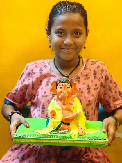 This young artist created her own Ganpati from scratch and painted it. Our classes empower students to handle every step of the creative process, from sculpting to final touches.