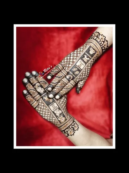 The full back-of-hand design for the baby shower mehendi.