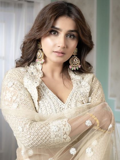 This portrait shot highlights the flawless base and subtle contouring achieved by our student. We teach how to create makeup that looks stunning both in person and on camera.