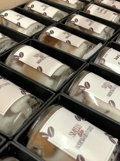 Here's a look at a custom bulk order for a cafe. We created these realistic iced coffee candles with their branding, perfect for retail or as part of a unique brand experience.