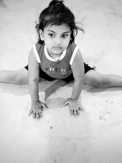 This little girl shows that flexibility training starts from a young age. Her determination is inspiring.