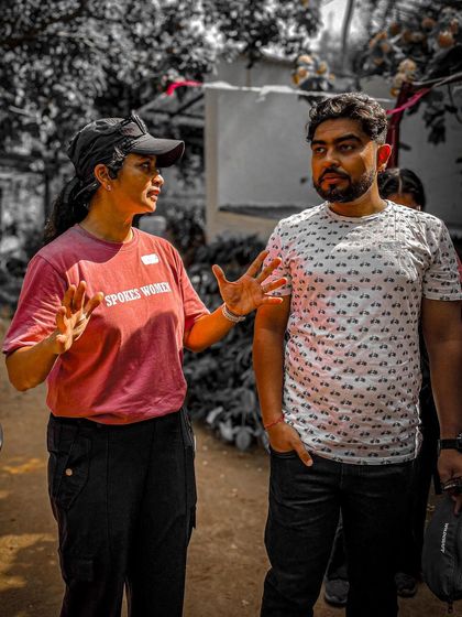 A candid shot of our members coordinating during the Garage Sale. Our community tees help identify our team and create a unified look.