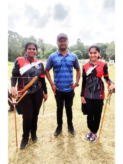 A photo with two of our competitors at the CISCE Regional competition. I'm proud to coach these dedicated young athletes.