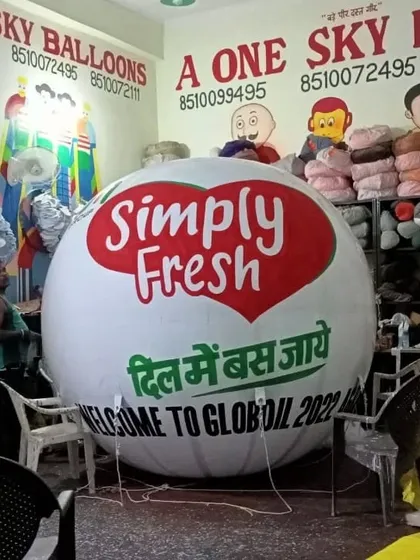 Another example of food and beverage branding on a large inflatable for 'Simply Fresh'. The mix of Hindi and English text caters to a wider audience.