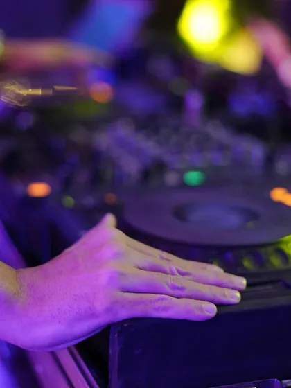 A close-up of my hand on the jog wheel, a fundamental part of beatmatching and mixing. It's this hands-on approach that makes a live DJ set special.