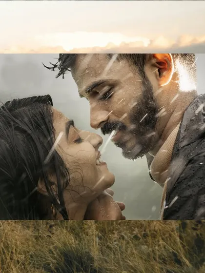 Embracing the romance of a rainy day. This atmospheric pre-wedding photo captures a close, intimate moment between a couple, with the falling rain adding a touch of cinematic magic.
