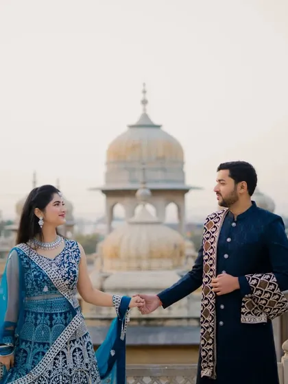This series of photos at Gaitor Ki Chhatriyan showcases a variety of poses, from intimate close-ups to grand wide shots. I work with each couple to find the angles and compositions that best tell their story against these beautiful marble structures.