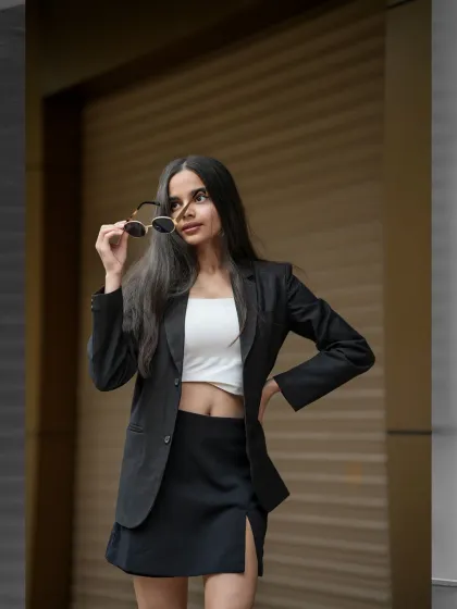 Capturing the modern boss-babe energy on the streets of Mumbai. This is for the influencer or brand that owns their power. The focus is on creating a chic, confident look with clean lines and an urban backdrop.