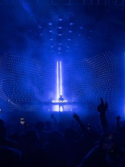 The energy of Dimitri Vegas & Like Mike is contagious. A single DJ on a massive stage, completely owning the moment with a sea of fans before him.