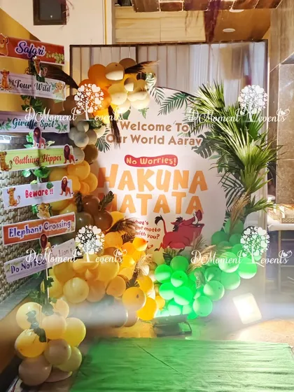 A "Hakuna Matata" welcome sign for the Lion King party, complete with a directional post pointing to different "safari" locations.