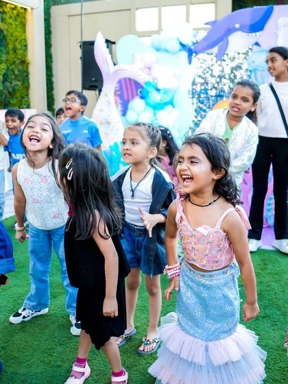 A group of kids completely engaged and having fun at the mermaid party. Their laughter and excitement are my biggest rewards.