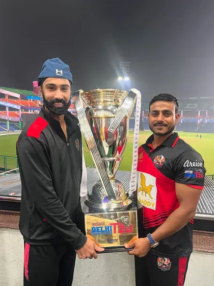 With one of our star players and the DPL trophy. His hard work and dedication were instrumental to our success.