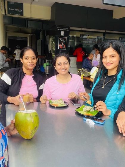 Sharing a post-aerobics breakfast with some of the ladies. Community is built both inside and outside the gym.