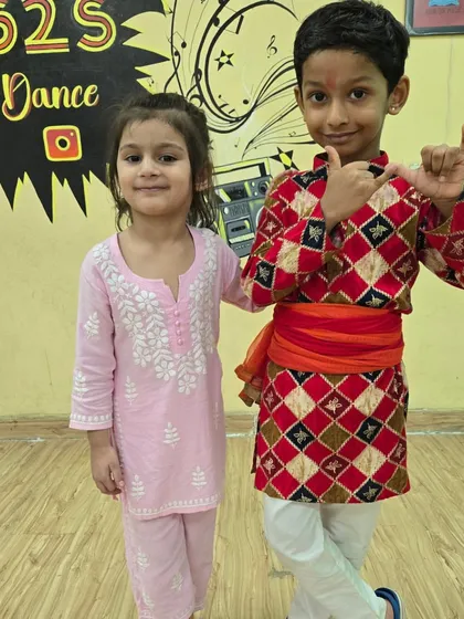 Posing in their Janmashtami attire. It's wonderful to see the kids embrace our traditions with such enthusiasm.