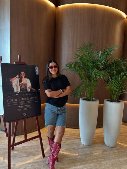 A solo shot with my 'Golden Hour Magic' event poster in Oman.