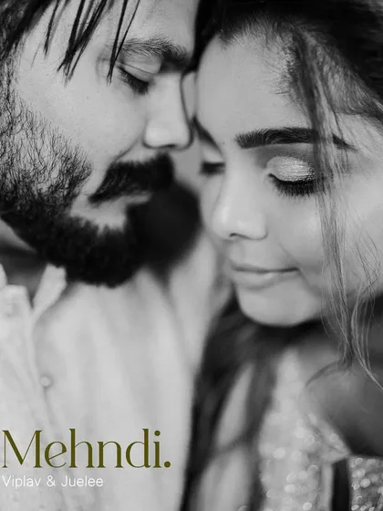 A beautiful and intimate black and white portrait of the couple, captured during the Mehndi event.