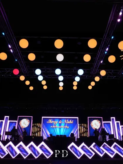 A massive LED stage setup for a grand Sangeet, with custom graphics and dynamic lighting creating a concert-like experience.