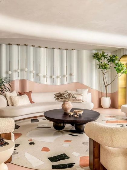 Another view of the living room from our FOAID feature, showing the custom terrazzo inlay that mimics a rug.