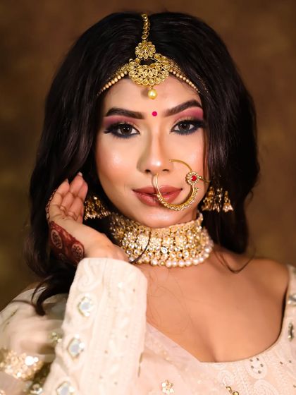 A happy bride makes all the effort worthwhile. Her smile says everything about how she feels in her final look.