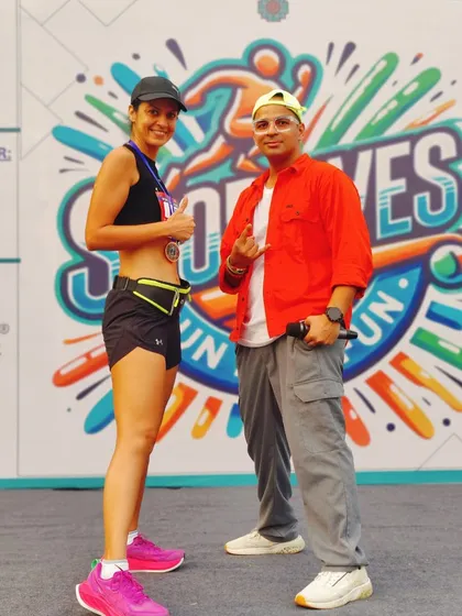 A great moment with a runner at the Sportives event. The vibrant energy and sense of accomplishment after a race are truly infectious.