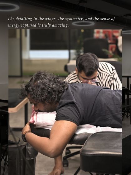 "The detailing in the wings, the symmetry, and the sense of energy captured is truly amazing." A client admiring the artist's work during the session.