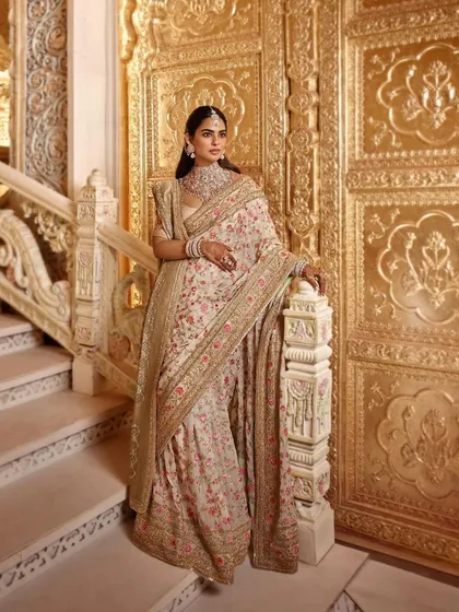 We called this the 'Garden of Love' look for Isha Ambani Piramal. The exquisite floral embroidery on this Manish Malhotra saree was an ode to her brother's wedding celebration. This is an example of deeply personal and thematic event styling.
