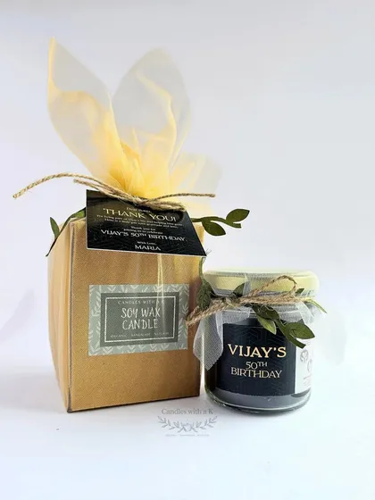 Milestone birthdays deserve a touch of elegance. For a 50th birthday, we designed these striking black soy wax candles with golden glitter and a custom label, all beautifully packaged to create a memorable return gift.