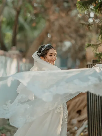 For my Catholic brides, I aim for an ethereal and timeless elegance. This look features soft, romantic makeup and a simple yet sophisticated hairstyle, allowing the bride's natural beauty to shine through her veil.