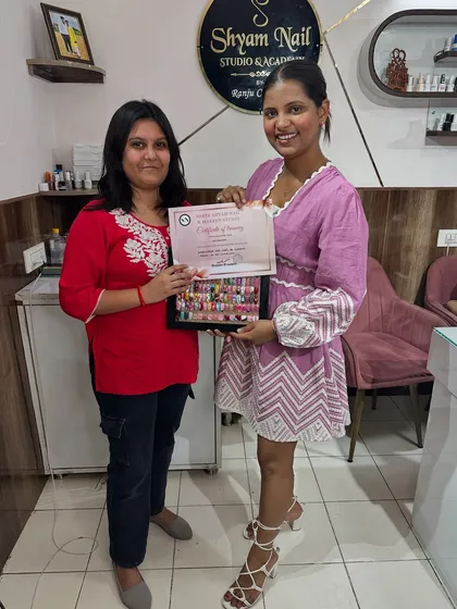 It's a joy to see my students succeed. Here's another graduate with her certificate and a full frame of her hard work.