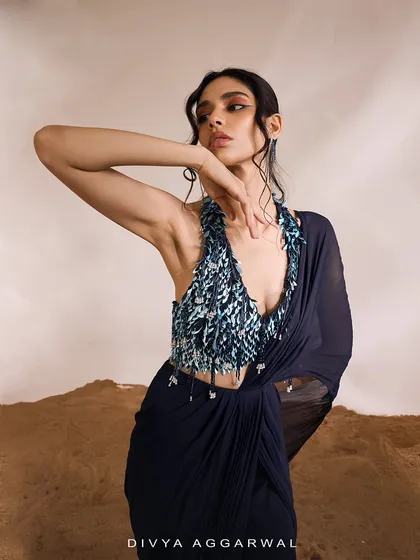 A closer look at the Renee Saree Set, where the tailored drapes and mesmerizing silhouette make it a must-have for your starry rendezvous.