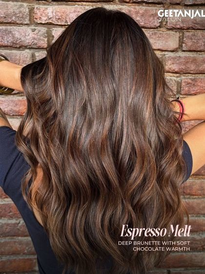 The Espresso Melt is a deep brunette with soft chocolate warmth. This color gives a rich, uniform look with subtle dimension that catches the light beautifully.