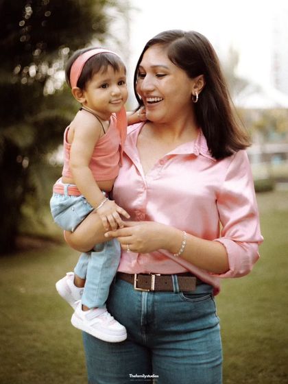 A mother and daughter sharing a smile. Our photographers excel at capturing the loving connection between parents and their children.