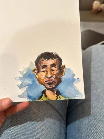 A quick watercolour caricature study of a man with his eyes closed, focusing on capturing facial structure and skin tones with minimal strokes.